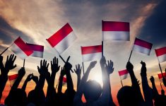 Ilustrasi pegang bendera (Source: Medcom)